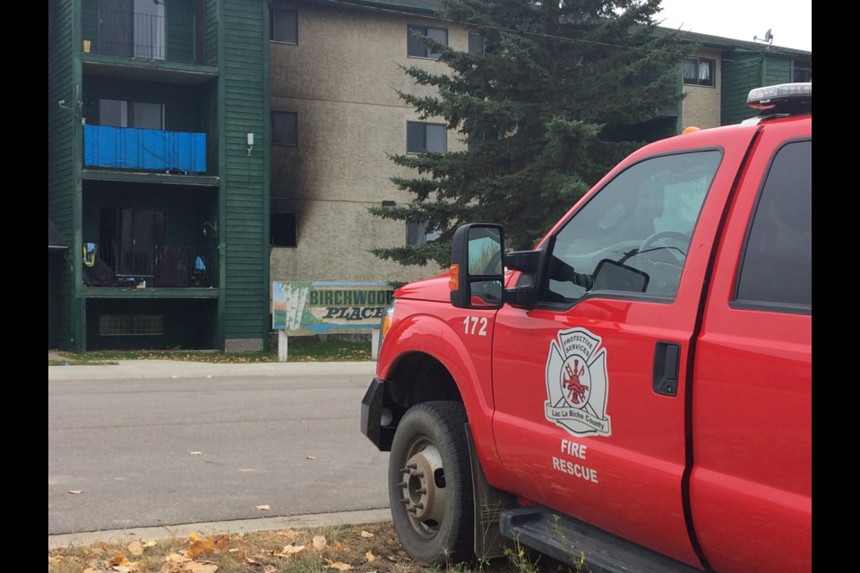 Lac La Biche fire officials remained at the scene of an overnight fire at the Birchwood Apartments. Residents of the building were evacuated. No one was seriously hurt in blaze that caused extensive damage .Image Rob McKinley