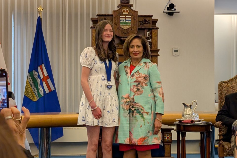 Abigail Britton stands next to Salma Lakhani, the lieutenant governor of Alberta, after receiving the Lieutenant Governor of Alberta Student Award during a ceremony in Edmonton on June 9. / Photo supplied. 