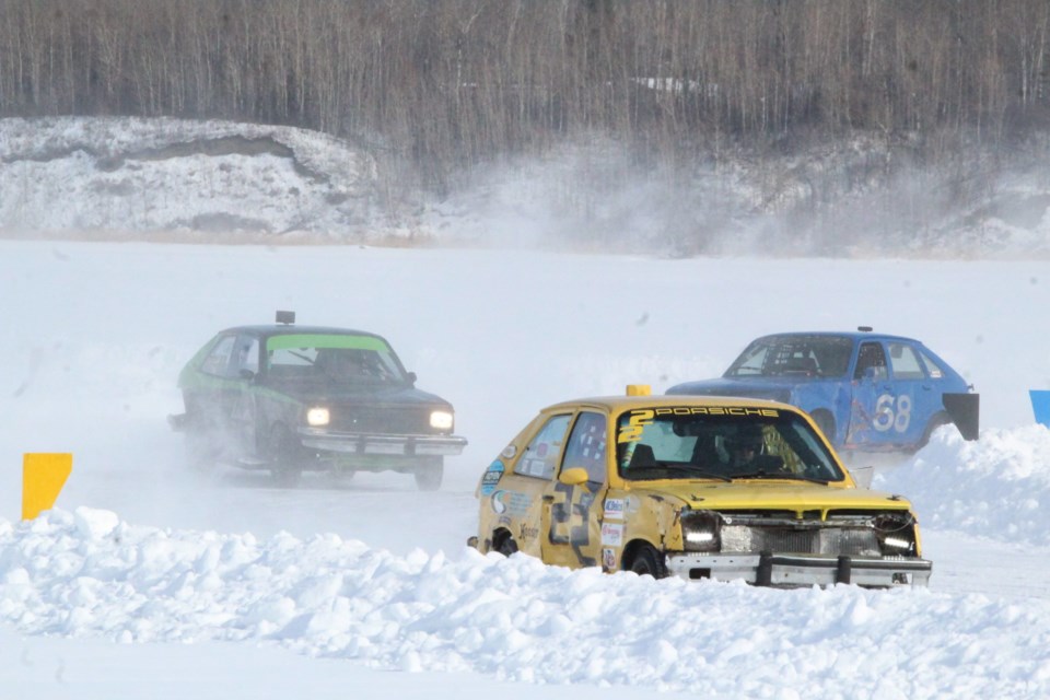 Bumper to bumper racing at  the Western Canadian Ice Racing Championships, part of the  Lac La Biche Winter Festival of Speed.