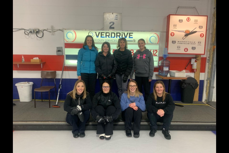 The A event winners at the ladie's bonspiel in Bonnyville include (back row) Marcelle Vallée, Kristine Darr, Jessica Zalaski and Delanie Cey. Runners-up (kneeling) were Dawn Holmes, Michelle Pashniak, Meagan Pulak, and Nicole Flanagan.