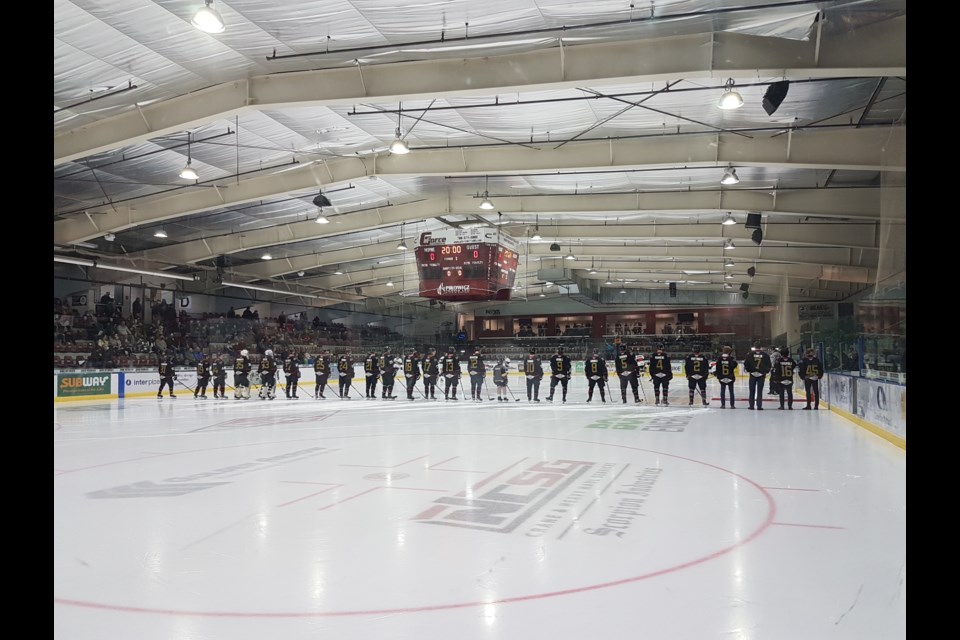 The Pontiacs AJHL team line up for the 2021-2022 regular season at the home opener in the R.J. Lalonde arena. 