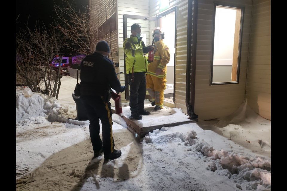 A Bonnyville RCMP member removed multiple fire extinguishers that appeared to have been discharged from the building.
