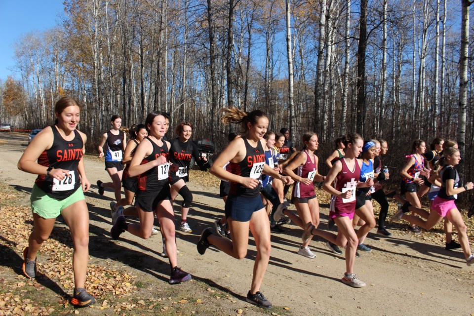 Senior and Intermediate Women took off from the starting line together during Cross Country Zones.