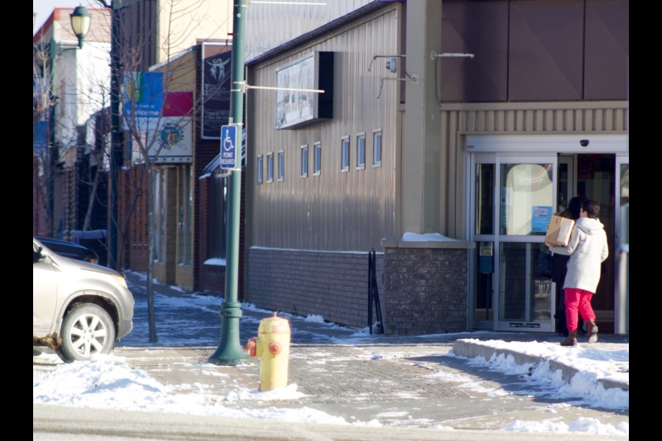 Sidewalks were clear along Main Street in the hamlet of Lac La Biche on Thursday. Businesses kept the store fronts clear after a series snowfalls that began this month. 