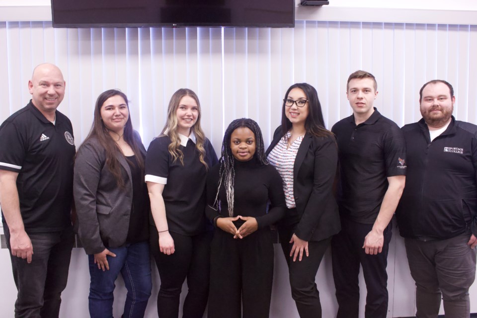 Portage College's team from the 2022 Alberta Deans of Business Case competition is: (starting left) coach Brain Thorne, Lara Thom, Katie Pankhurst, Miriam Kabonesa, Kelly Orr, Jake Mosich and Dylan Craig.