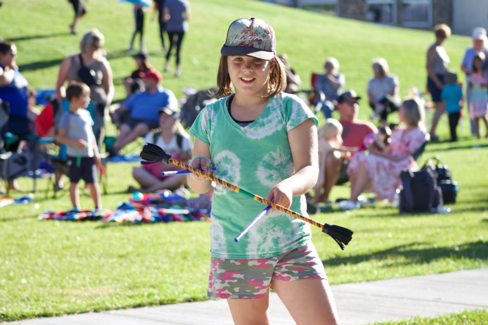 Asia Flumian participated in a handful of carnvial games for community members to enjoy during the Carnival in the Park event on Aug. 9. The event was held in McArthur Park in Lac La Biche and saw over 100 attendees enjoy performances, games and carnival food.