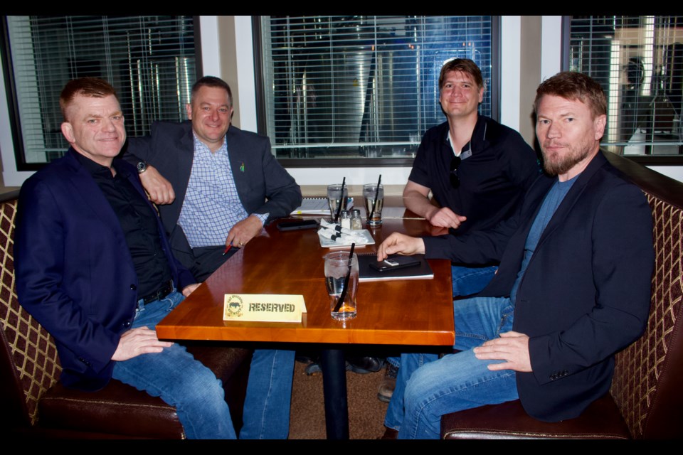 Fort McMurray-Lac La Biche MLA Brian Jean (front-left) visited the community last Friday for a meet and greet as a part of an awareness campaign for local Economic Development Week, which was hosted by regional groups. The event was held at Lac La Biche County's Mayor Paul Reutov's (front-right) establishment the Fat Unicorn. Also pictured is Lac Ste. Anne-Parkland UCP MLA Shane Getson (top-left) and John Andersen, Lac La Biche County's Director of Economic Investment and Retention (top-right).

