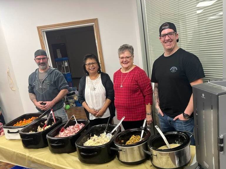 Community volunteers and employees from local businesses took time on Christmas Day to volunteer their time cooking and serving up hot meals to those in need at the Bonnyville Friendship Centre.