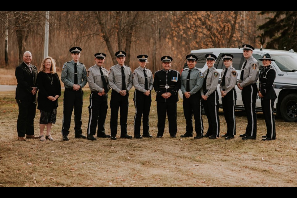 Community Peace Officer Induction Program (CPOIP) graduating class.
From Left to right: Instructor Aaron Young; Portage College President, Nancy Broadbent; Community Peace Officer, Brennan DeBoer; Community Peace, Officer Scott Elford; Community Peace Officer, Bradley Thibeault; Community Peace Officer, Eva King; Superintendent and manager of Enforcement Services in Lac La Biche County, Chris Clark; Community Peace Officer, Quoc Truong; Community Peace Officer Kaitlyn Schneider; Community Peace Officer, Jessie Koples; Community Peace Officer, Devon Nielsen and
Instructor Ashley Blanchard.