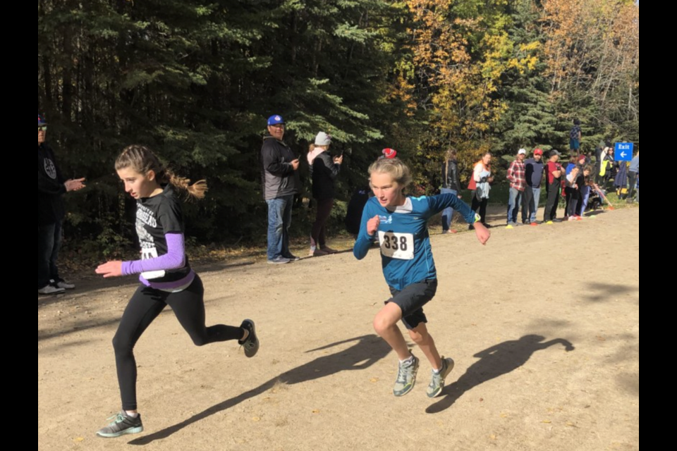 On Oct. 5, a handful of schools and students across the Lakeland region participated in the Lakeland Students Athletic Association (LSAA) 2022 annual Cross-country Race. Elementary to high school students who participated ran route that ranged from 1.5 to 3 km. Lilly Bakker (right) came in first place in the Novice category.