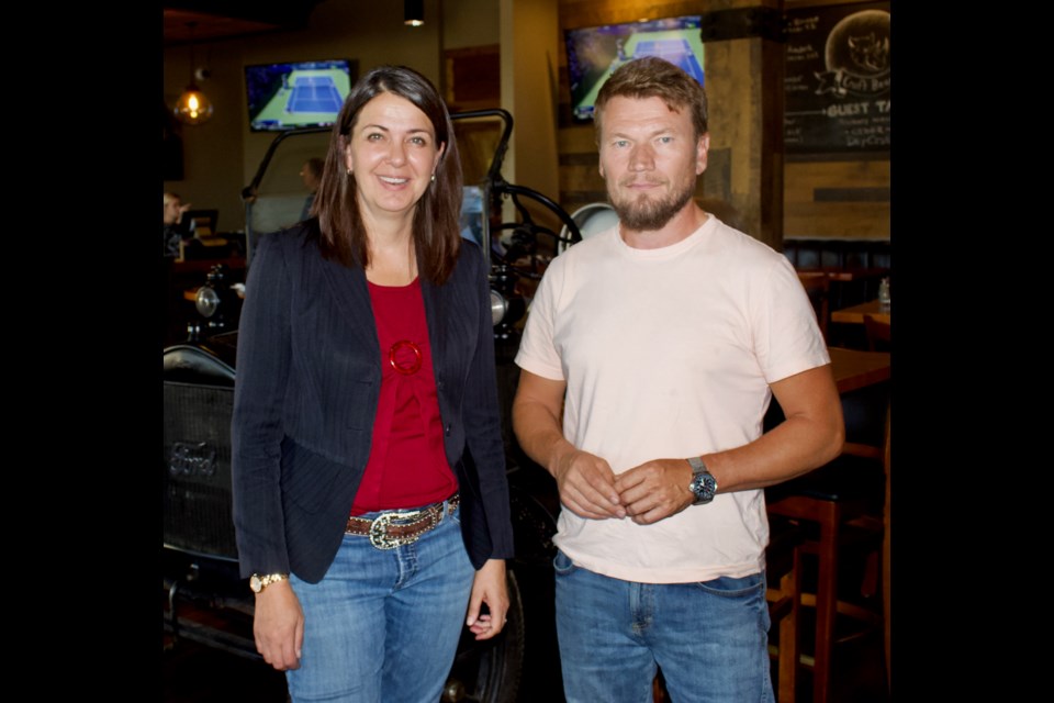 Former Wildrose party leader and UCP hopeful Danielle Smith (left) made her way to Lac La Biche County on Aug. 31, 2022. The event, hosted at the Fat Unicorn, drew over 20 UCP members, constituents and municipal officials who meet and spoke with Smith about a range of topics. Also pictured is Lac La Biche County Mayor Paul Reutov.