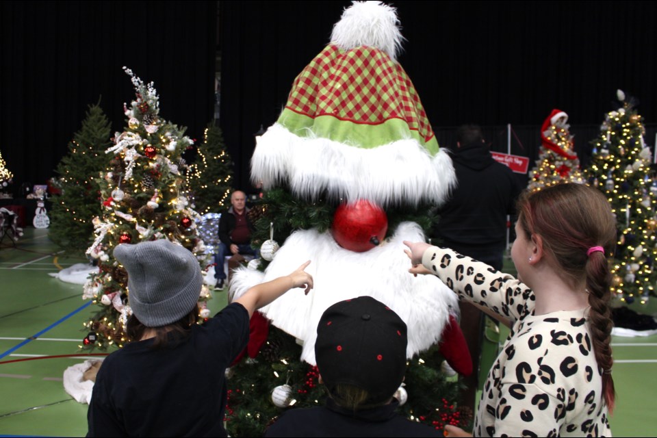 A Christmas tree up with a big red ornament for a nose caught the attention of kids at the Festival of Trees over the weekend.