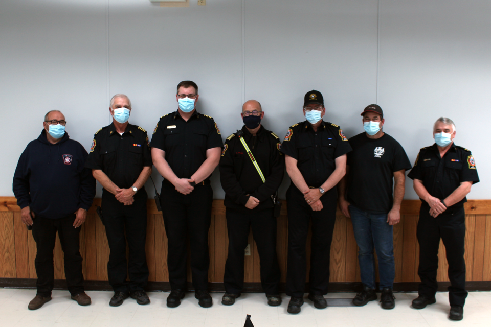 (Left to right) John Benio, Deputy Station Chief from Station 6 LaCorey, Gordon Graves, Station Chief from Station 4 Iron River, Cordell Ackert, Station Chief from Station 7 Fort Kent, Craig Wenzel, Station Chief from Station 5 Bonnyville, Derek Neumann, Station Chief from Station 8 Ardmore, Dan Amalia, Station Chief from Station 3 Glendon, and Glen Aylesworth, Deputy Station Chief from Station 2 Goodridge and 911 Supervisor.