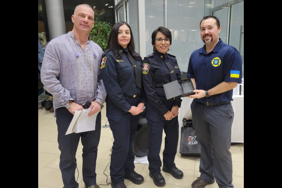 On Dec. 4, the Lac La Biche County Fire Department was recognized for their specialized gear and protective equipment donations to support Ukrainian firefighters during the ongoing war led by Russian forces.  An award was presented to the department at a special event hosted by non-profit Firefighter Aid Ukraine. Pictured are (left to right) Kevin Royle, Firefighter Aid Ukraine project director; Leah Larocque, Lac La Biche firefighter; Nicole Cardinal, Lac La Biche firefighter and Christopher Perka, Firefighter Aid Ukraine assistant director. 

