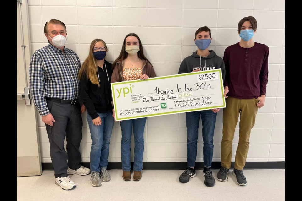 Haying in the 30's presenters (left to right) Roy Ripkens (school board trustee/judge) , Ashlyn Tkachuk, Elaina Bokota, Taylor Ballard and Teagan Dadey.