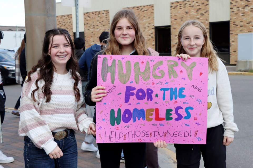 École Notre Dame High School students collect donations for the Bonnyville Food Bank at three locations on Sept. 28 -downtown Bonnyville, Sobey’s Grocery Store, and the Centennial Centre. Hungry for the Homeless is an annual event put on by students and staff.