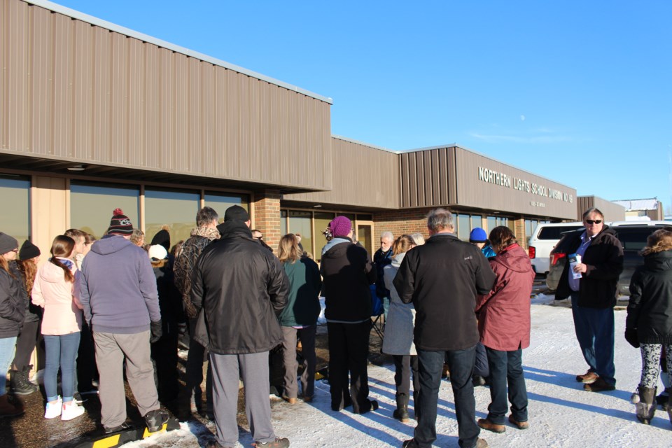 Roughly 40 Lakeland parents took a stand outside the Northern Lights Public School (NPLS) Division building during a Board of Trustees meeting on Jan. 11.