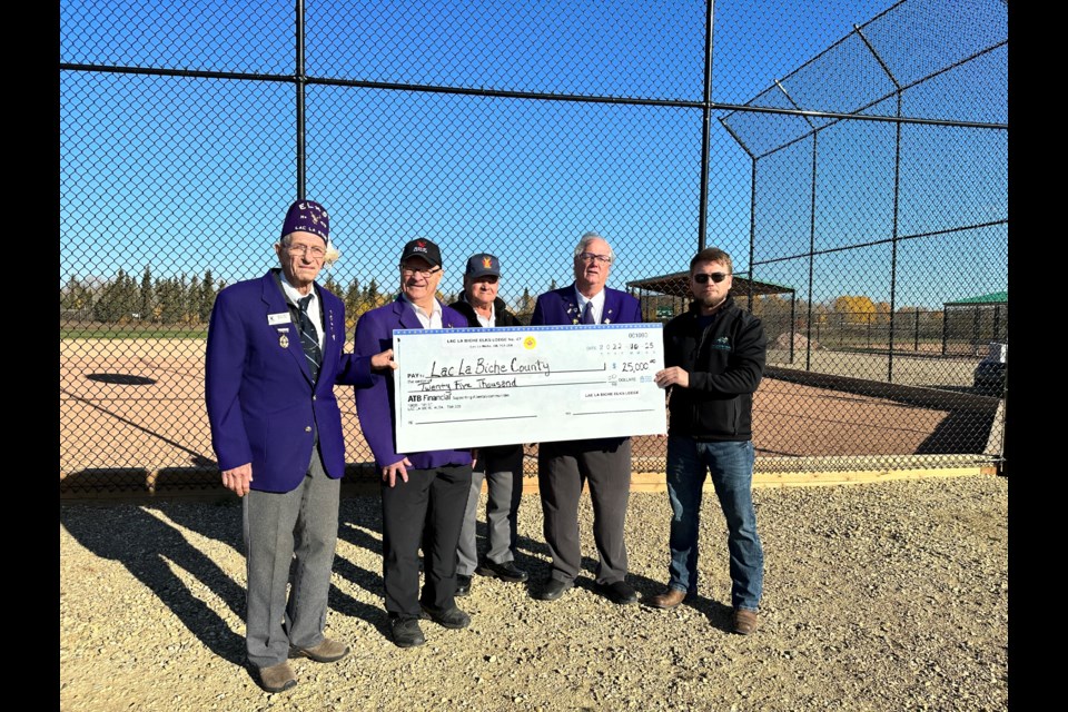 On Oct.12, Ball Diamond One was officially named after the Lac La Biche Elks Lodge No. 470 through a 10-year $25,000 sponsorship deal. Pictured are Greg Beach, Elks Lodge No. 470.  secretary treasurer; member Steve Chorzempa; member Allen Barna;  Danny Stevens, Elks Lodge No. 470. President and Lac La Biche County Mayor Paul Reutov.