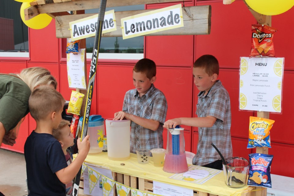 Running the Awesome Lemonade stand was Matthew and Mattias Crick, with the help of their younger brothers Joseph and Zachariah.