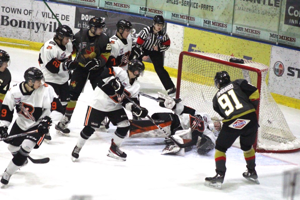 While chaos ensues around the front of the Lloydminster Bobcats crease, Sebastian Tamburro is perfectly positioned to place the puck in the back of the net.
