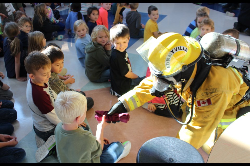 Bonnyville Regional Fire Authority (BRFA) members and volunteer firefighters stop by École des Beaux-Lacs on Oct. 11 to teach students about fire preparedness during this year's Fire Prevention Week.