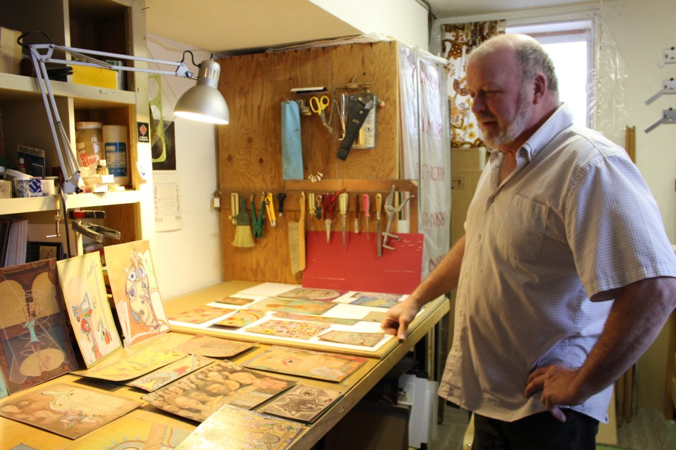 Standing over his most recent works of art in his Bonnyville studio and framing workshop, Vasseur is surrounded by over 50 years of his own body of work.