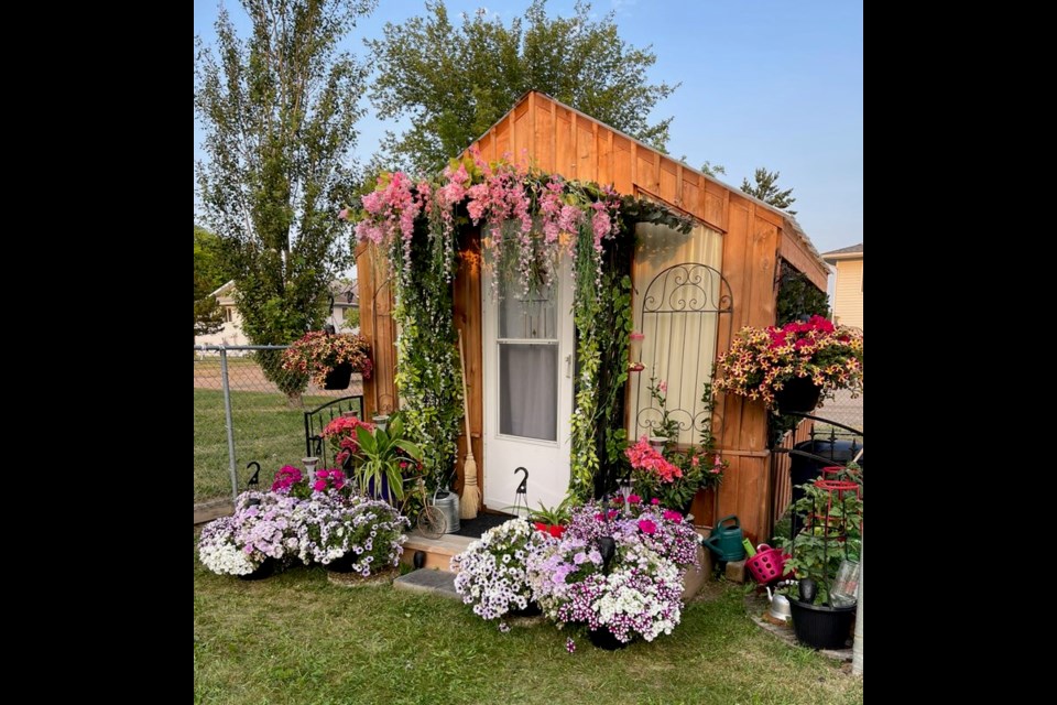 Over a three year period, Marge Woods transformed her green house into a personal sanctuary.