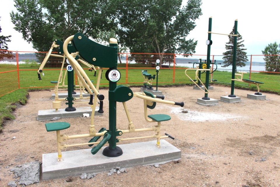 Construction for an adult outdoor fitness equipment along the Jessie Lake walking trail is near completion.