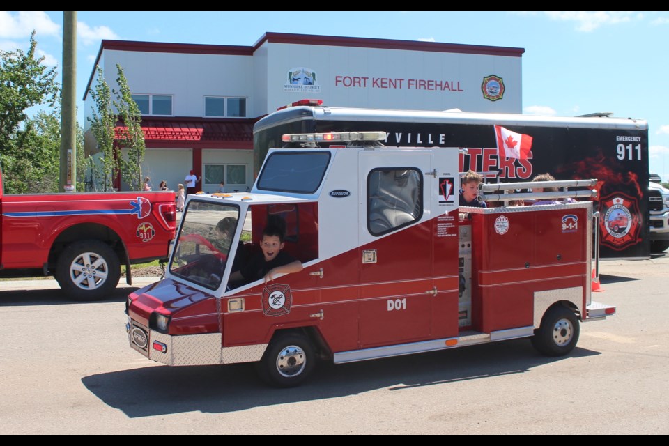 During the Fort Kent Fire Hall grand opening, youth got to go for a ride in the Bonnyville Regional Fire Authority's smallest fire truck.