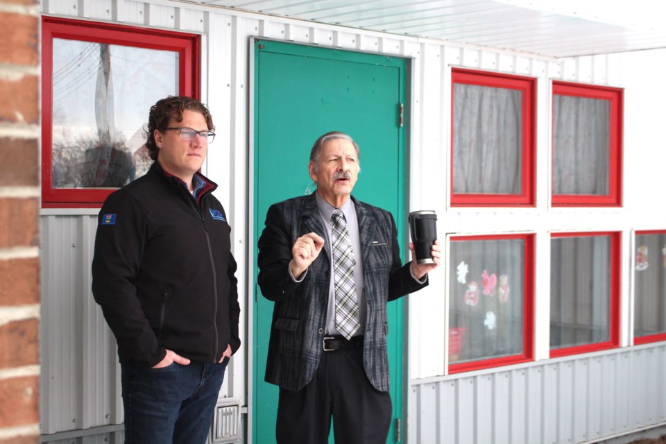 Former executive director of the Bonnyville FCSS, David Beale (right) gives Minister Jeremy Nixon (left) a tour of the FCSS that also doubles as the Ohana Centre.