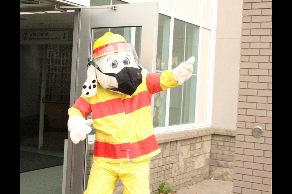 Sparky gives the all clear for staff and students to return to class. The entire school was able to safely exit the school in under four minutes.
