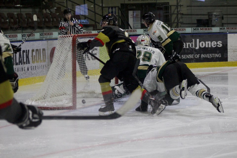 Nicolas Beaudoin, #21, earns the Pontiacs their fifth goal of the night with an assist from Victor Barakett and Mike Cataldo.