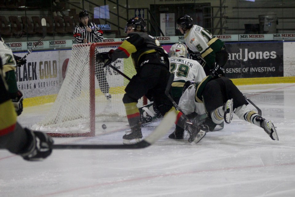 Nicolas Beaudoin, #21, earns the Pontiacs their fifth goal of the night with an assist from Victor Barakett and Mike Cataldo.