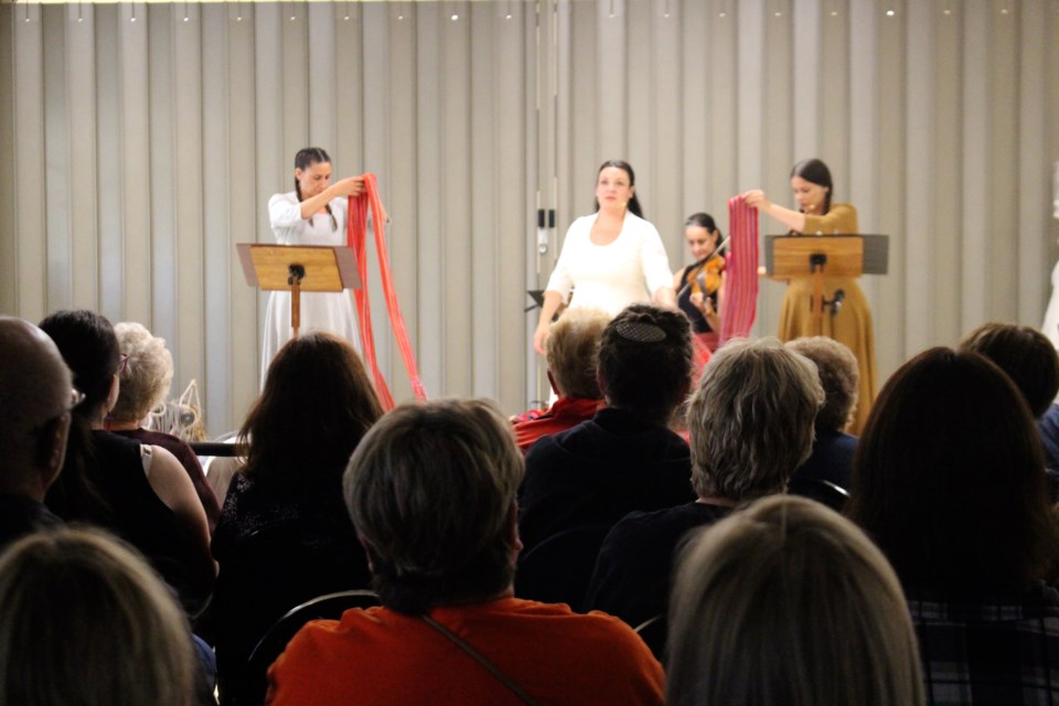 'You used to call me Marie,' performed at the St. Louis Parish Hall on Aug. 4.