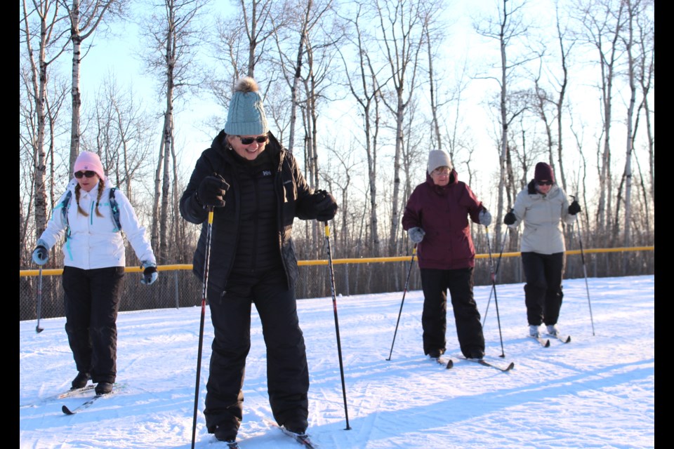Participants new to the sport of cross-country skiing took some time to getting used to the unfamiliar equipment.