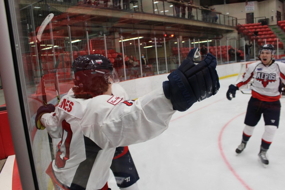 Areos celebrate following a goal by Sean Symes with the help of Stephen Mosgopolous and Ethan Joe. 