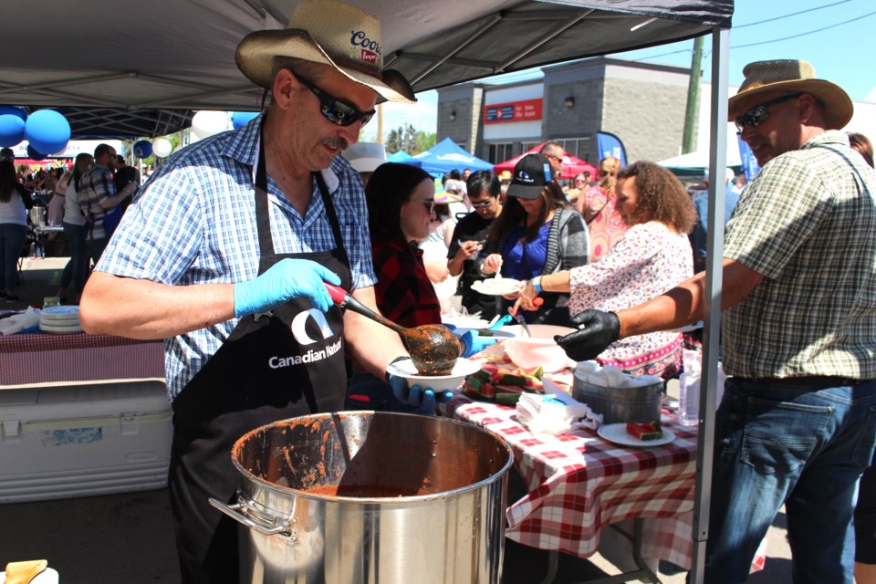 Canadian Natural Resources Limited employee dishes out chili that went on to win the ‘People’s Choice Award.’ 