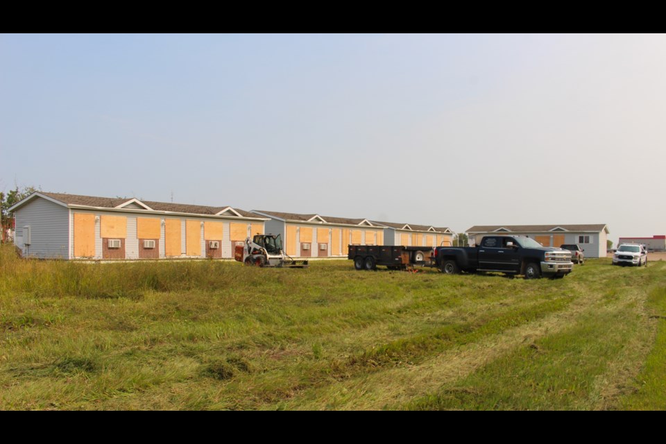 The Town of Bonnyville stepped in to deal with a nuisance property after fielding several complaints. On Aug. 21, RCMP members searched the vacant structures to confirm the units were empty before crews boarded up access to the buildings and cleared overgrown vegetation from the property.