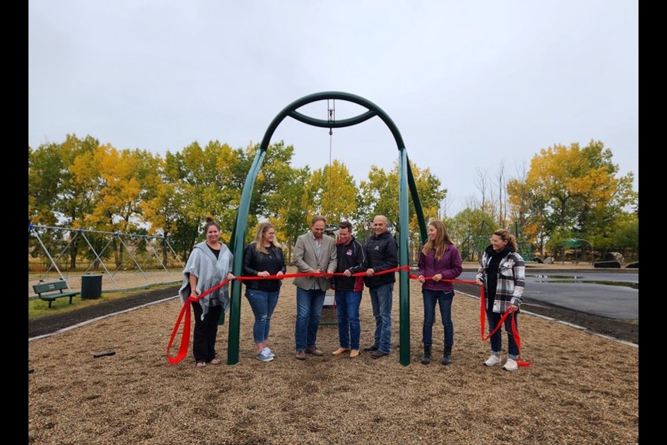 Karen Draycott (former principal of Iron River), Jennifer Wakulchyk (chair of the Iron River School Parent Advisory Council), Reeve Barry Kalinski, Dustin Blake (Iron River School's principal), MD Coun. Don Slipchuk, Alisha Kunec (vice chair of the Iron River School Parent Advisory Council), and Jessica Wakulchyk (member of the Iron River School Parent Advisory Council), left to right.