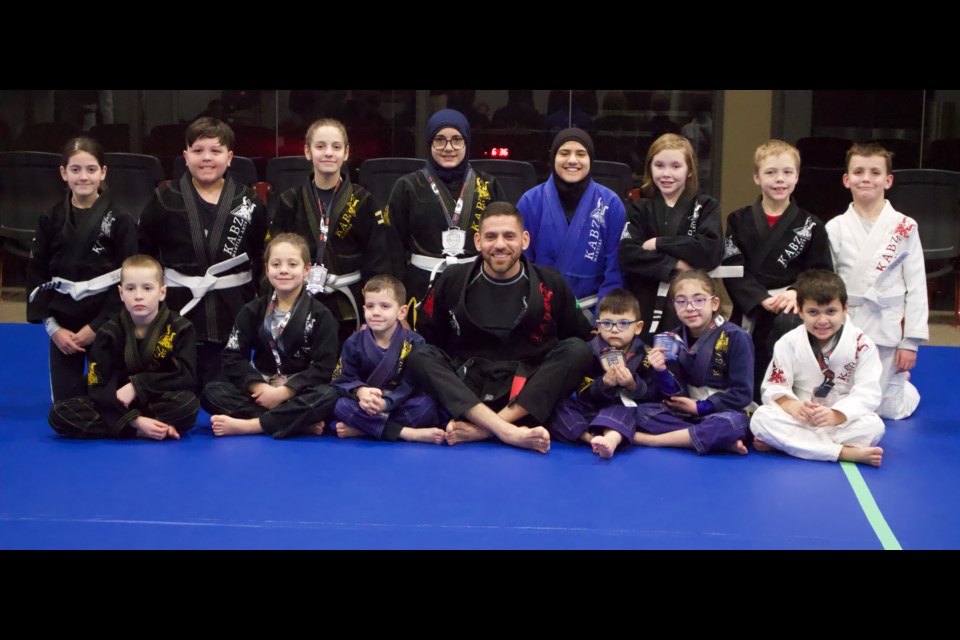 Kabalan with the younger participants in KABZ Martial Arts 