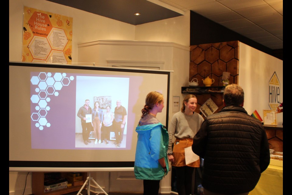 Youth that were fundamental in the concept and design of the Hive Lakeland Youth Hub, Morgan Gillis and Sonja-Jocelyn Theriault, share their experiences with sponsors and community members at the open house on Oct. 25.