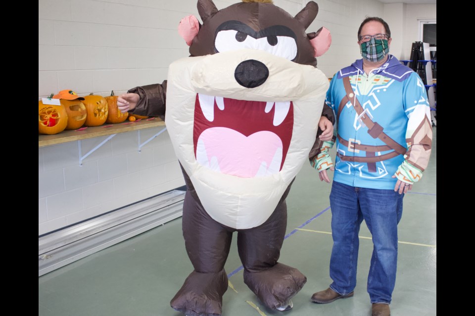 Aurora Middle School Halloween event. Principal Conal Donovan (right) and student.