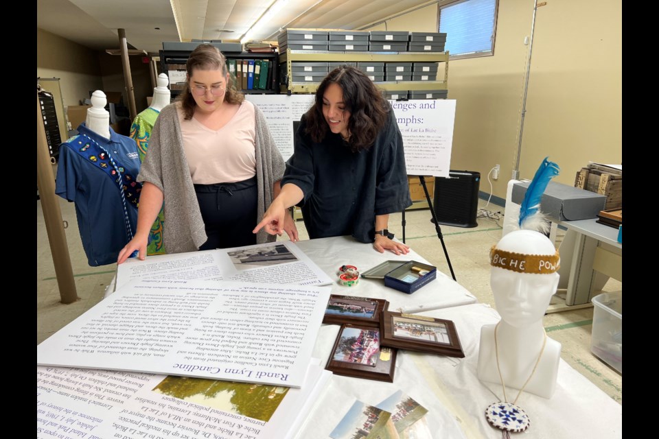 The Lac La Biche Museum is opening a new exhibit next month dedicated to celebrating women in the community. The Challenges and Triumphs: Trailblazing Women of Lac La Biche  will debut on Sept. 2. Pictured is exhibit curator's Ally Fornad (left) and Najiah Moghrabi.