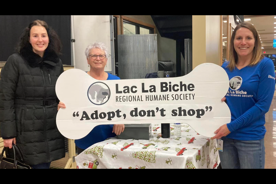 The Lac La Biche Regional Humane Society (LLBRHS) held a 50/50 fundraiser on Nov. 26 during the Festival of Trees at the Bold Center. The draw raised roughly $2700 with Dayna Gingras (left) taking home half the prize. Nancy Litzenberger, LLBRHS treasurer and Staci Lattimer (right), LLBRHS director at large, presented the prize.