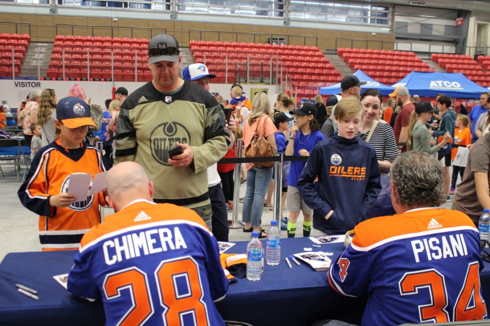 Oilers alumni Jason Chimera and Fernando Pisani were on hand to sign autographs and pose for photos with fans at the ATCO community kick off barbecue at the Cold Lake Energy Centre on May 26.