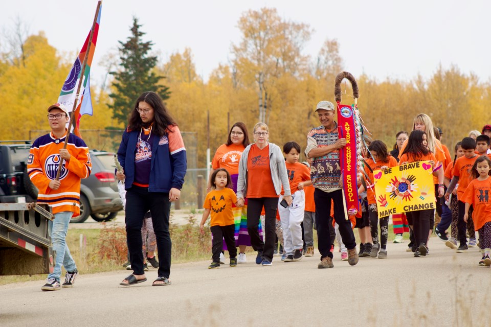 Amisk Community School in Beaver Lake Cree Nation participated in a walk on Orange Shirt Day in the community on Sept. 29, 2022. The walk from the school to the community health centre was led by a ceremonial group of Indigenous drummers and singers. 