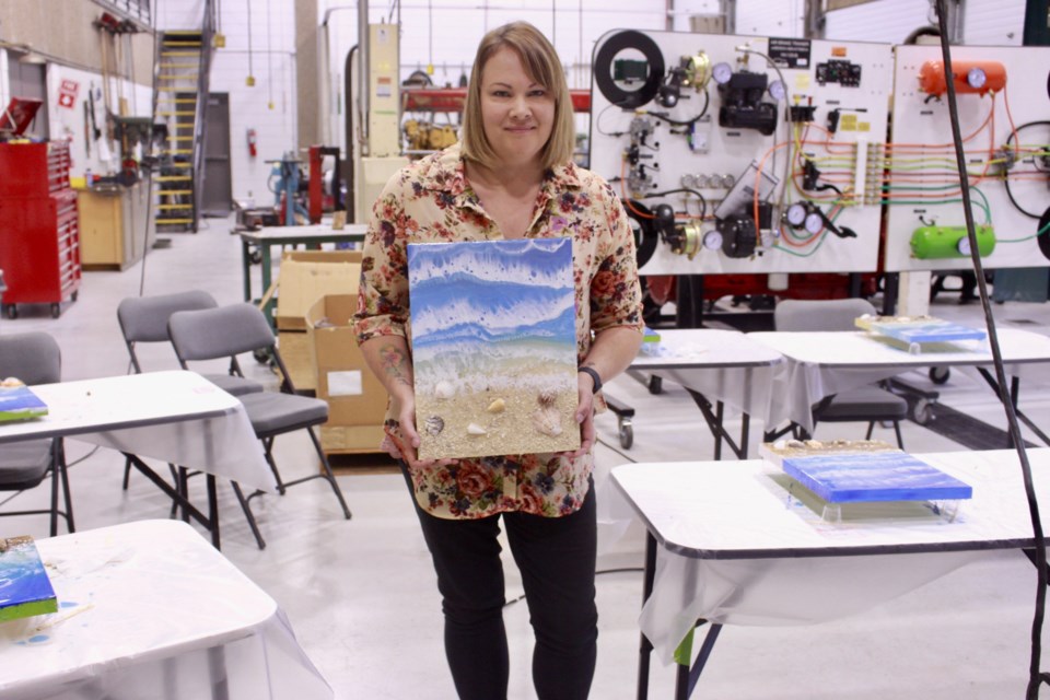 Plamondon based artist Melanie Braund taught a unique resin painting workshop for the first time last Wednesday at Portage College to ten participants.
