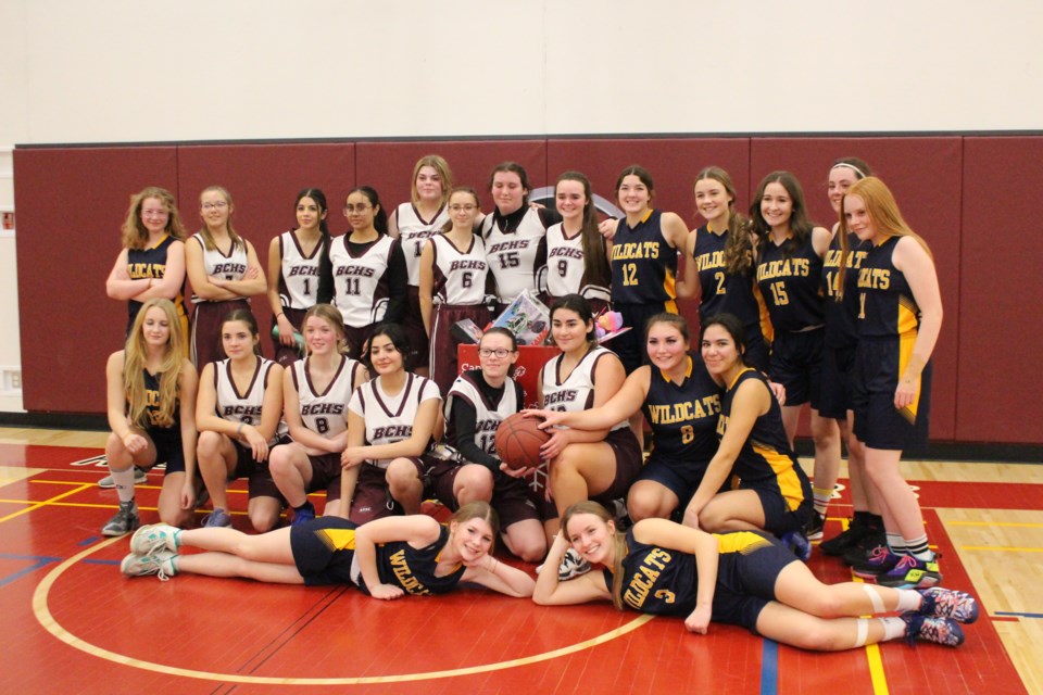 BCHS and NDHS's varsity women's basketball teams went head-to-head during a charity game that raised donations for the Santa's Elves program on Dec. 12.