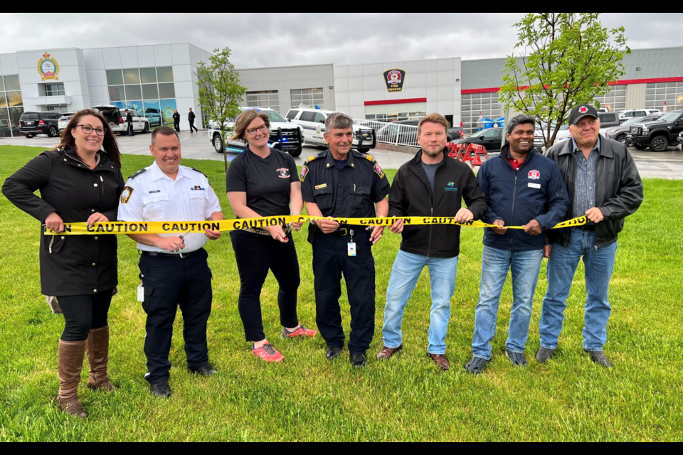 The Protective Services Building was officially open to the public Tuesday. Marking the opening of the facility was the official cutting of the ‘caution’ tape on June 14, 2022. (Left to right) Lac La Biche County, Coun. Charlyn Moore; Enforcement Services Manager, Chris Clark; firefighter, Natasha Downs; Protective Services Manager, John Kokotilo; Lac La Biche County Mayor, Paul Reutov; Lac La Biche County councillors' John Mondal and Sterling Johnson.
