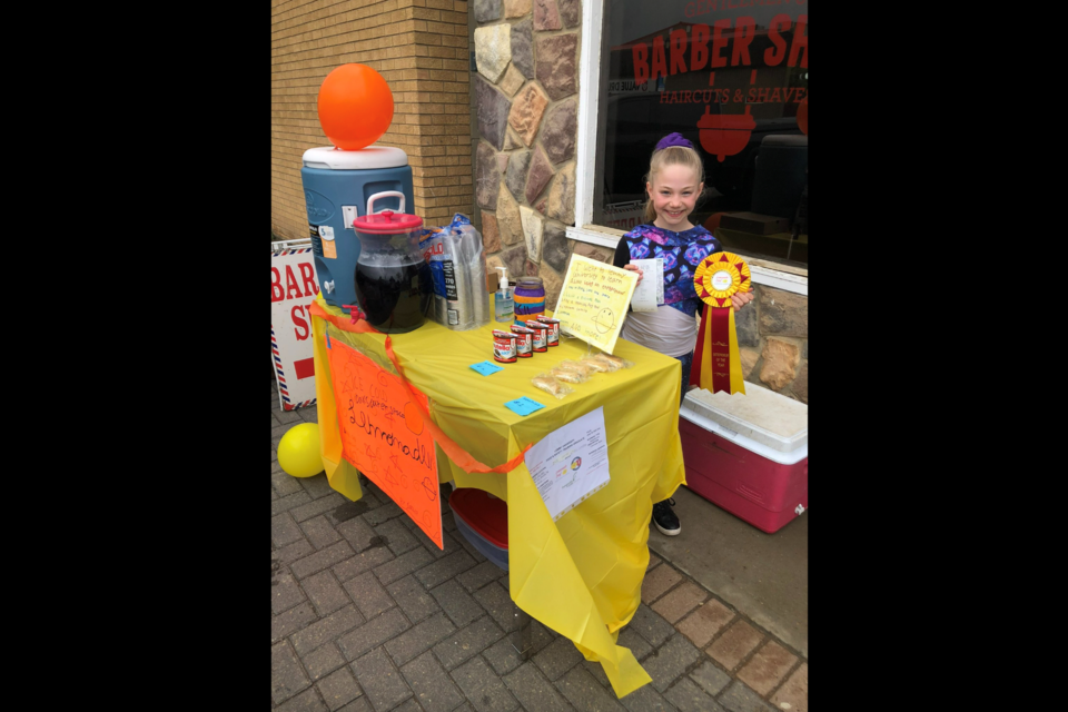 For eight-year-old Oakley Brownlie, who set up her lemonade stand just outside Omar's Barber Shop in Lac La Biche County, the annual event was about more than just garnering profits.
